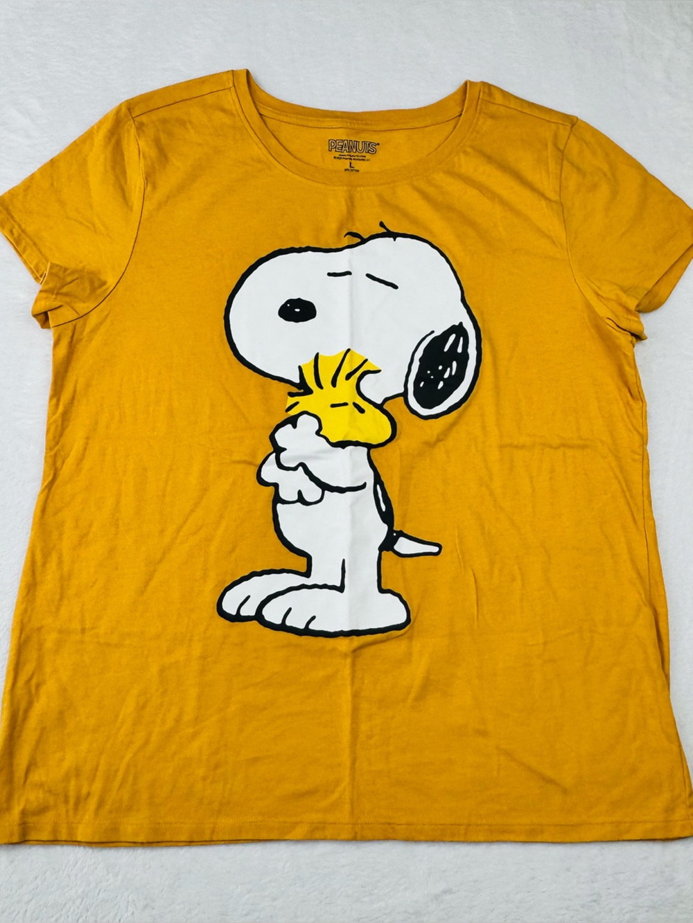 Peanuts Snoopy Woodstock graphic t-shirt. Mustard yellow color. Womenโs size L.